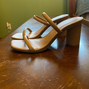 Little strappy nude heels.